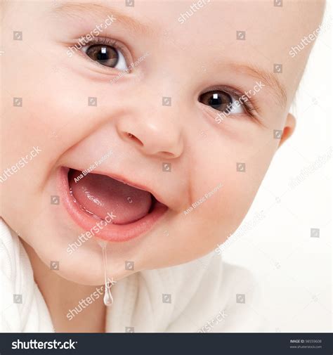 Close Up Of An Adorable Baby Drooling, On White Background Stock Photo ...