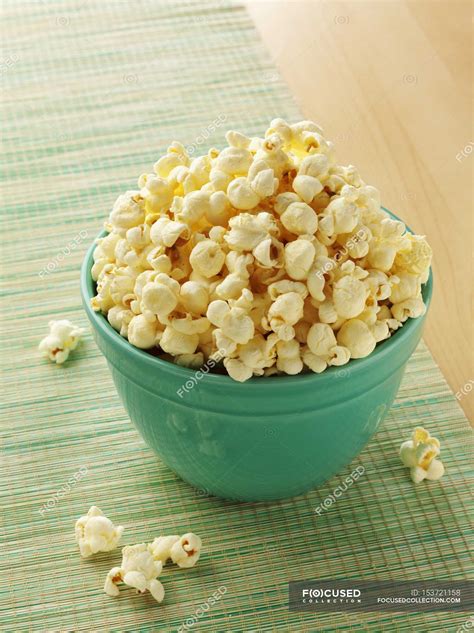 White cheddar popcorn — straw, seasoned - Stock Photo | #153721158