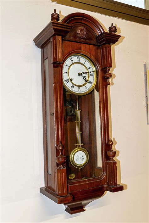 Antique Pendulum Clock In Inlaid Wood Photograph by Cardaio Federico ...