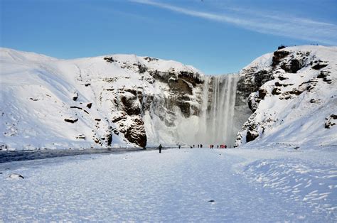 Skógafoss Waterfalls below the Eyjafjöll mountains and west of ...