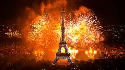 Eiffel Tower at night fireworks. Eiffel Tower illuminations.