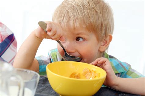 Free Photo | Breakfast. boy by the table