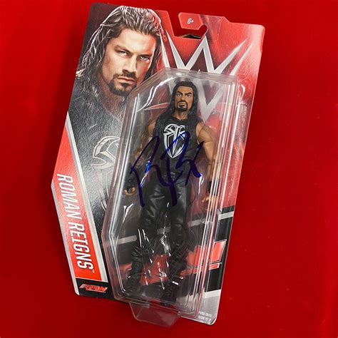 Roman Reigns SIGNED WWE Raw Action Figure (Auction 2) | WWE Auction