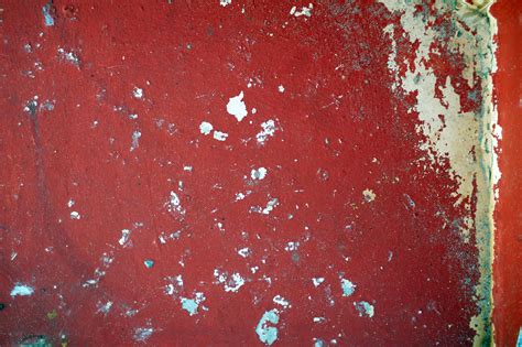 Free Image of Old Textured Flaked Red Paint on a Wall | Freebie.Photography