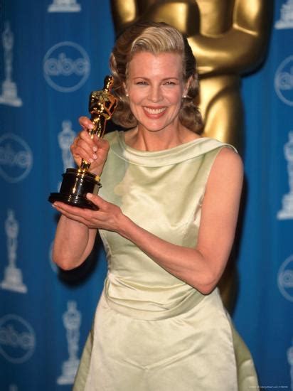 'Kim Basinger Holding Her Oscar in Press Room at Academy Awards ...