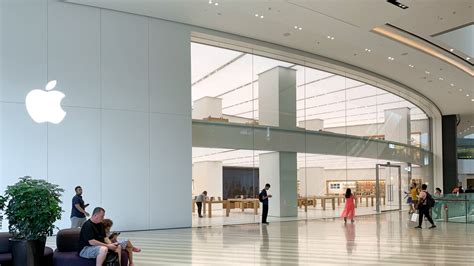 Sweeping glass facade of Apple Jewel Changi Airport unveiled in ...