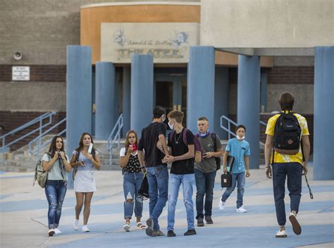 Students greet each other outside at Moapa Valley High School before ...