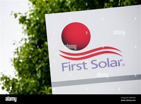 A logo sign outside of a facility occupied by First Solar in Perrysburg ...