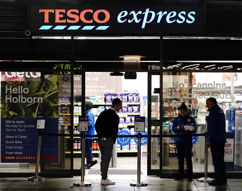 Tesco launches checkout-free stores where you can walk out and pay by ...