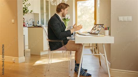 Funny Shot: Businessman Wearing Jacket and No Pants Uses Laptop and ...