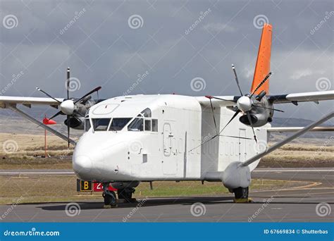 Small white cargo plane stock photo. Image of business - 67669834