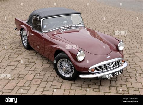 Daimler Dart convertible sports car on cobble stones Stock Photo - Alamy