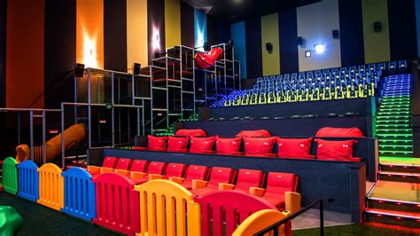 These theaters have playgrounds because everyone loves loud kids at ...