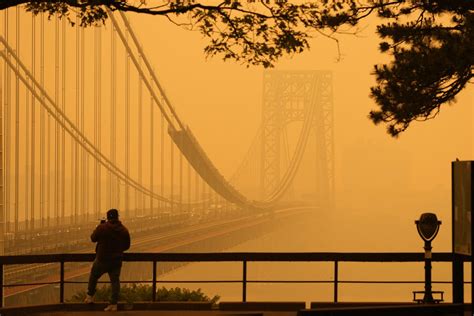 6 haunting photos that capture NYC and other cities covered in smoke ...