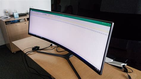 Yes, please! Samsung’s 49-inch ultrawide curved display is basically ...