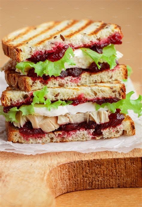 Turkey or chicken sandwich featuring berries, berry, and board | Food ...