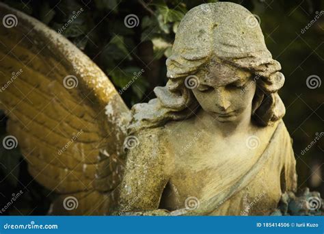 Antique Stone Statue of Sad Angel. Retro Styled Image Stock Photo ...