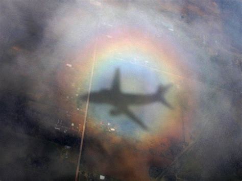 bright circular rainbow from an airplane, “glory” [OC] : r/pics