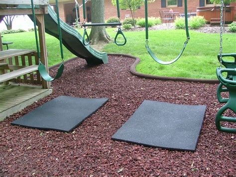 rubber mat under swings so you don't wear that mulched area down. also ...