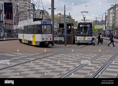 De Lijn trams at the National Bank tram stop in the centre of Antwerp ...