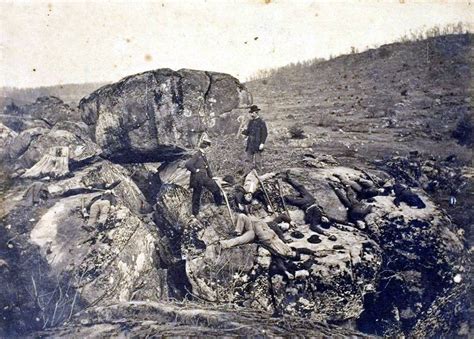 Staged photograph of posed "dead" soldiers in Devil's Den months after ...