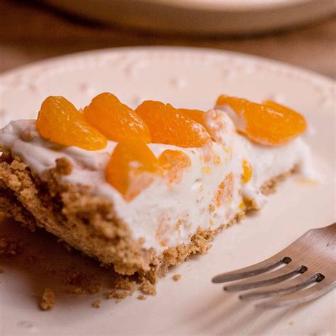 fast and easy to make this mandarin orange no bake cheesecake is a ...