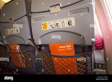 UK BRISTOL EASYJET BOEING 737-700 INTERIOR BACK VIEW OF CHAIR WITH ...