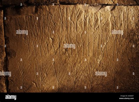 Runes inside the Maes Howe Burial chamber.Viking graffiti Nr Stock ...