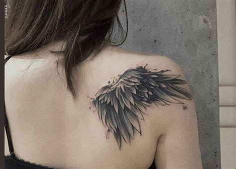 Raven wing back tattoo in 2023 | Feather tattoos, Book tattoo, Raven wings