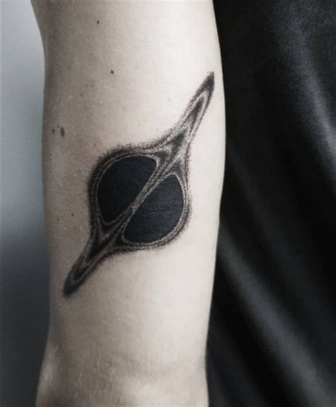 Black hole | Shape tattoo, Small tattoos, Physics tattoos