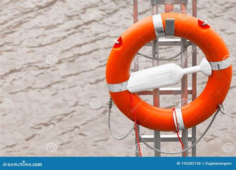 Water Safety Equipment. Red Lifebuoy Stock Photo - Image of buoy ...