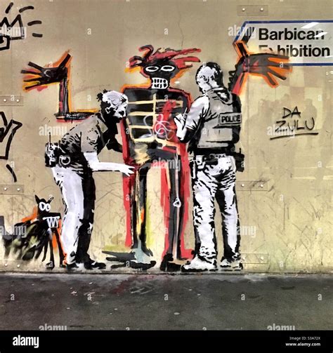 Banksy street art graffiti on artist Basquiat at Barbican in London ...