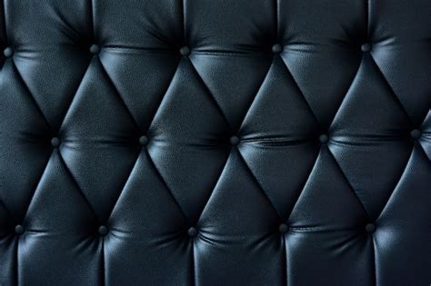 Premium Photo | Close-up dark blue sofa leather texture for background