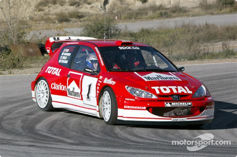 Gilles Panizzi in the new Peugeot 206 WRC 2003 at Peugeot 206 WRC 2003 ...