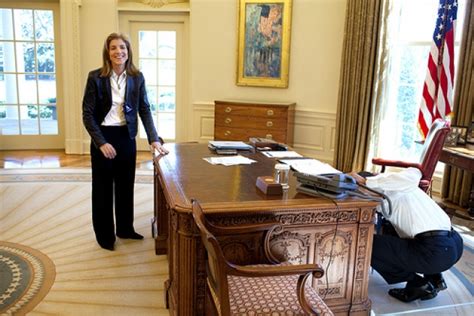 President Barack Obama examines the Resolute Desk | The White House