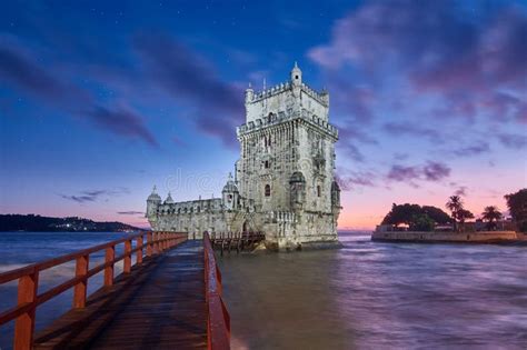 Belem tower at sunset stock photo. Image of clouds, torre - 194668742