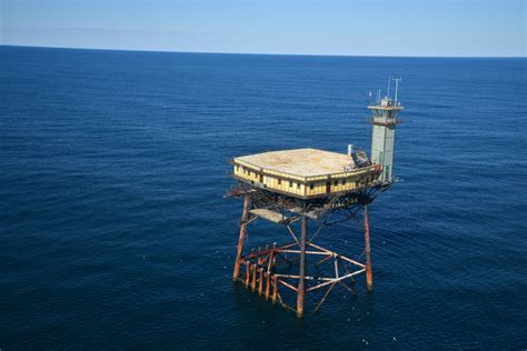 An old converted coastguard light tower surrounded by Atlantic waters