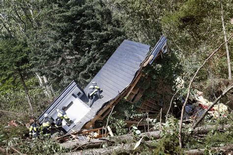 Japan earthquake and typhoon in pictures: Dozens buried as landslides ...