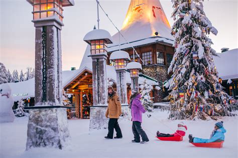 family-crossing-arctic-circle-santa-claus-village-rovaniemi-lapland ...