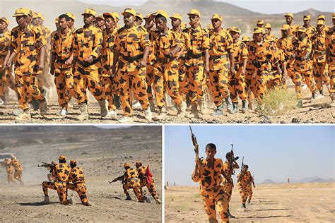 Yemeni police pictured training in desert dressed in garish bright ...