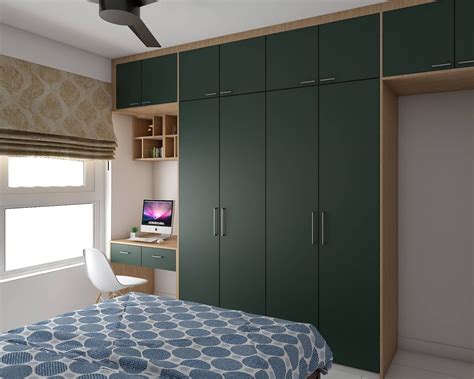 Spacious Dark Green Hinged Wardrobe Design With Lofts And Study Unit ...