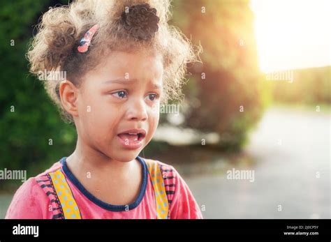 Portrait of little girl crying with tears rolling down her cheeks Stock ...