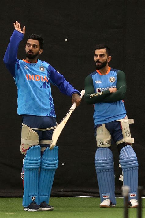 KL Rahul and Virat Kohli have a chat during a training session ...