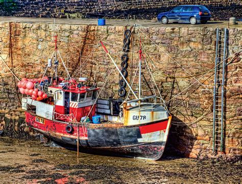 Alderney Harbour, Low Tide | A fishing boat sits on the mud … | Flickr