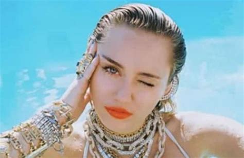 Miley Cyrus Shows Off Her Jewelry In Bikini Photos