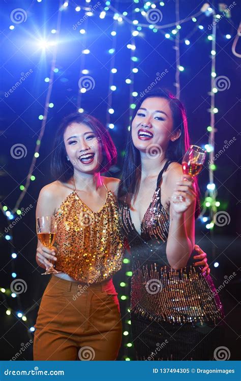 Pretty women in night club stock image. Image of young - 137494305