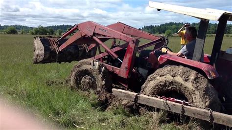 Tractor stuck in mud solution - YouTube