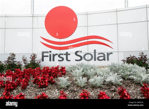 A logo sign outside of a facility occupied by First Solar in Perrysburg ...