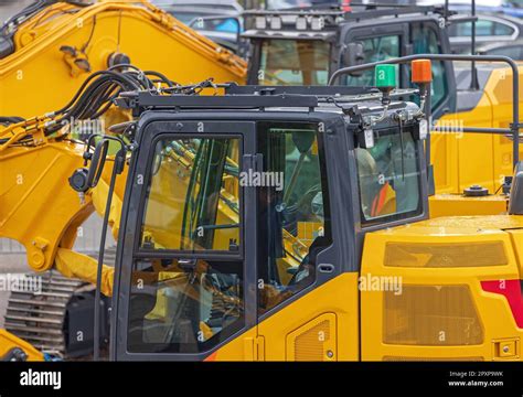 Driver Cabin Large Digger Machine at Construction Site Stock Photo - Alamy