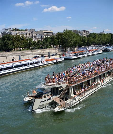 Tourists On A Seine River Boat Tour Of Paris, France. Editorial Stock ...